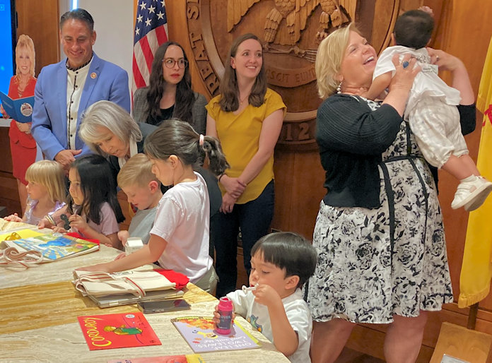 Kids looking at books