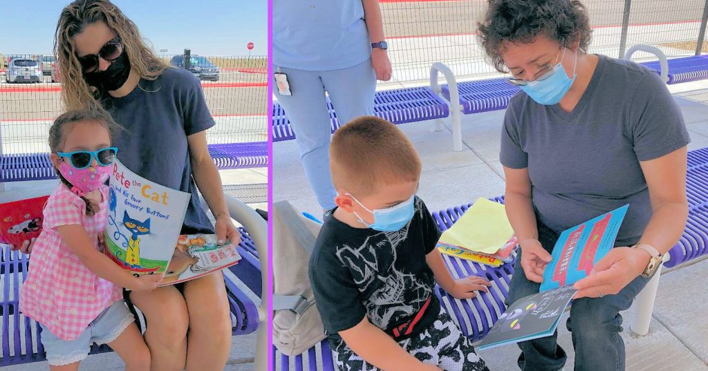 Children reading their free take-home books purchased by the Friends.